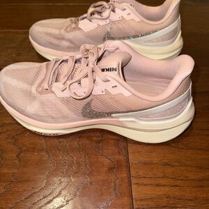 Nike Women's Light Pink Athletic Shoes with Silver Accents